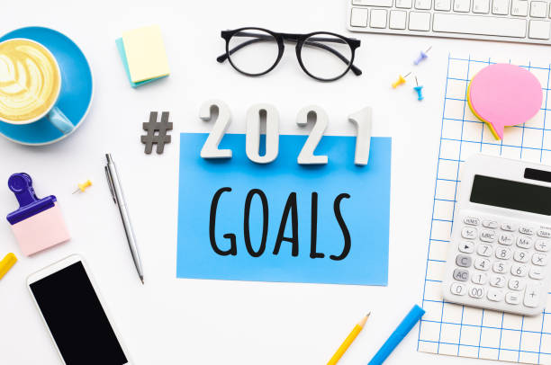 istock 2021 goals  with modern office accessories 1272447901