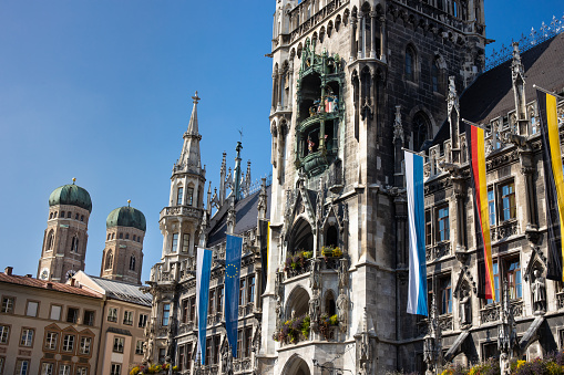 Munich Marienplatz with the city hall with the Glockenspiel and in the background the Church of Our Lady (Frauenkirche)