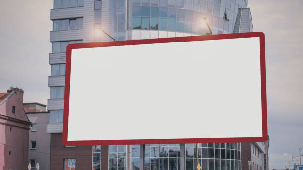 istock big white empty street billboard in red frame under lamp lights advertising concept 1272451314