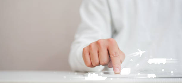 istock close up on man hand touching on digital tablet screen to shopping online on e-commerce website and select transportation delivery function for modern lifestyle and global business concept 1272452345