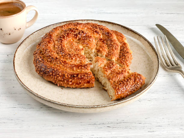istock coffee and braided cookie with sesame on table 1272453301