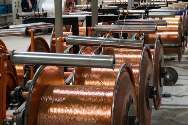 Production of copper wire, bronze cable in reels at factory Production of copper wire, bronze cable in reels at factory. steel cable photos stock pictures, royalty-free photos & images