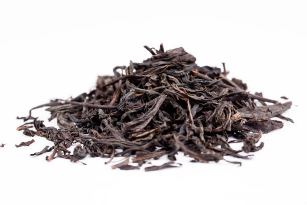 istock Heap of black tea dried leaves 1272454246