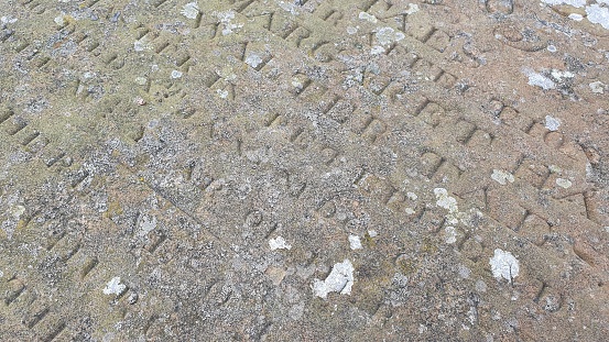 Close up of inscription on old gravestone