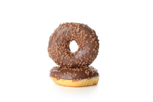 istock Tasty baked donuts isolated on white background 1272456407