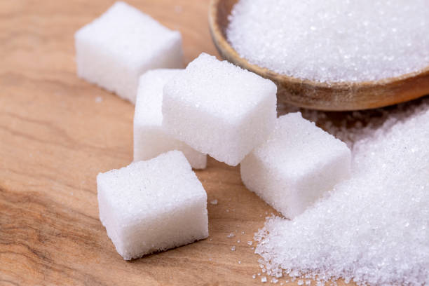 istock Close up of white sugar cubes 1272456434