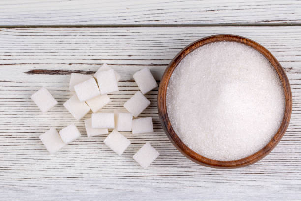 istock Close up of white sugar cubes 1272456435