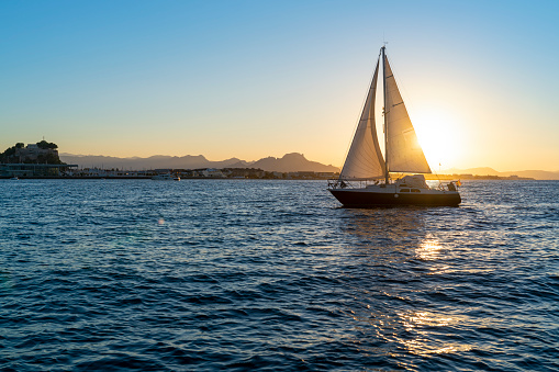 Denia sunset sailboat from the Mediterranean sea of Alicante Spain