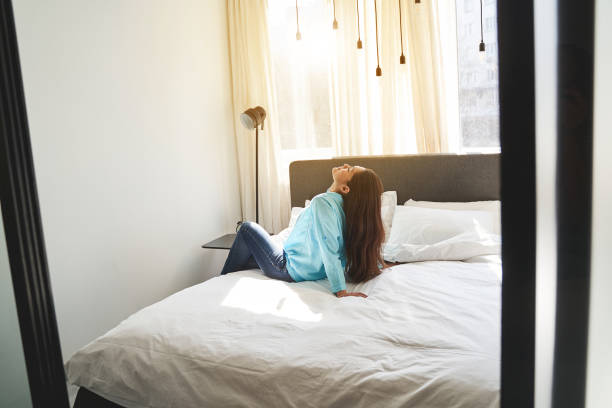 istock Young woman relaxing with her eyes shut 1272458516