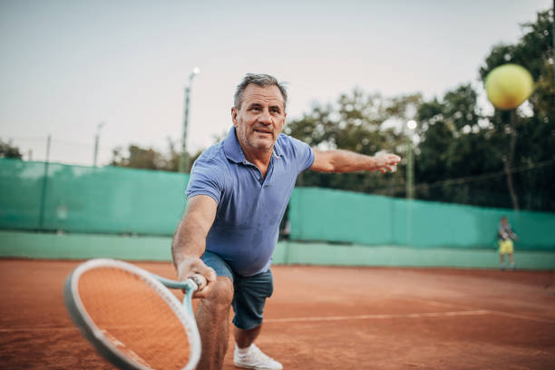 istock One elderly man playing tennis 1272459782