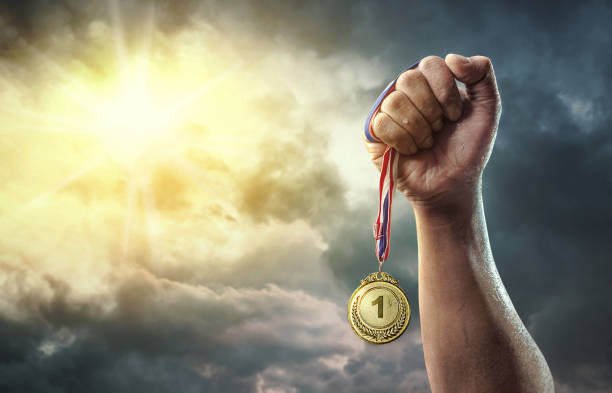 istock Medal for the first place on sky background. Victory concept 1272460191