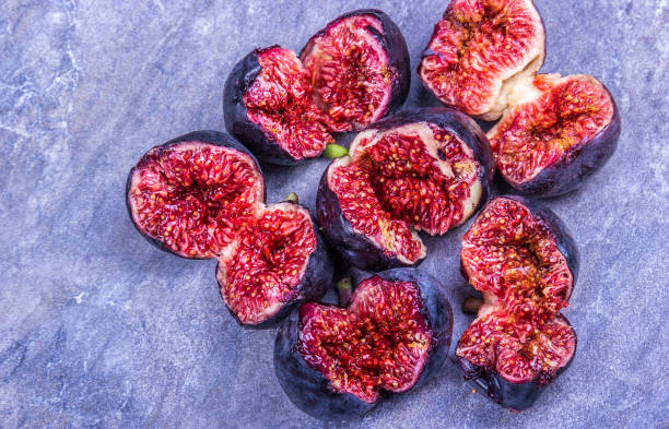 istock Juicy tropical fig fruits. Fig pieces 1272462362