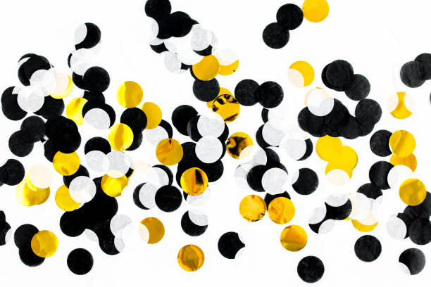 Colorful paper confetti on white background. Celebration concept. Flat lay. Top view