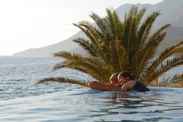 istock Enjoying with dad in the pool 1272464276