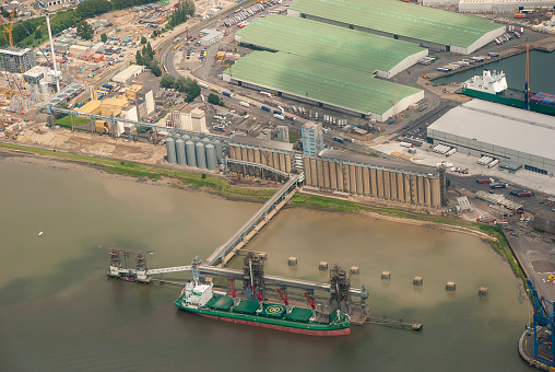 A cargo ship docked on the River Thames in Essex