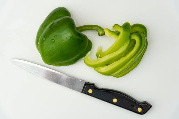 photo of a bell pepper being prepared for cooking shot from above
