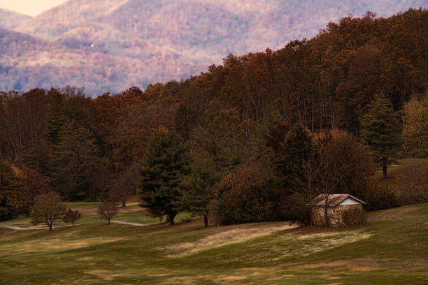 Retro look of old shack and the autumn countryside of North Carolina