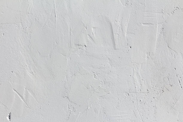 Elegant concrete wall with uneven artistic plaster