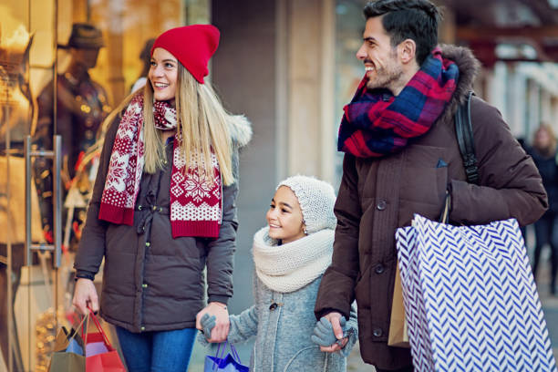 istock Young couple is shopping at Christmas 1272478288