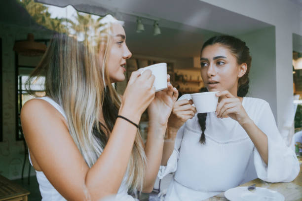 istock Enjoying coffee with friend. 1272478554