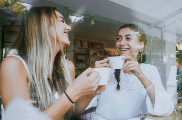 istock Enjoying coffee with friend. 1272478581