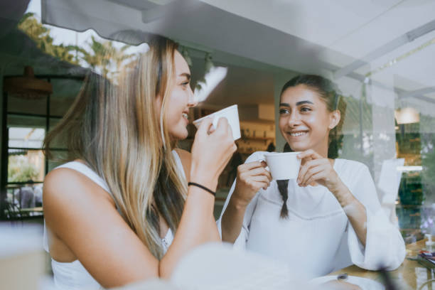 istock Enjoying coffee with friend. 1272478648