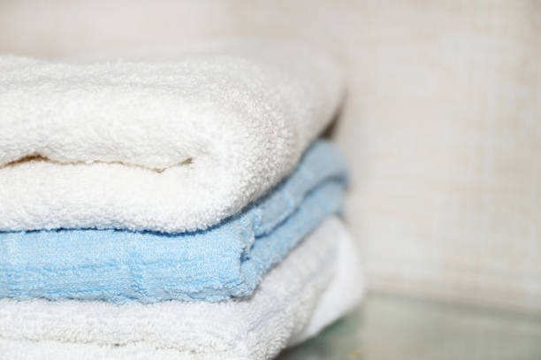 istock folded terry towels close up on a light background 1272480629