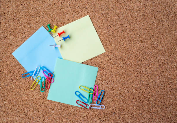 istock Collection of various note papers on corkboard 1272483856