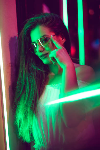 istock Woman and neon light 1272484953