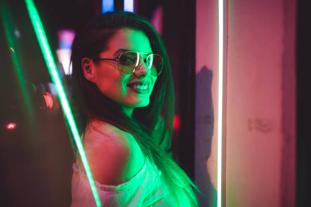 istock Woman and neon light 1272484983