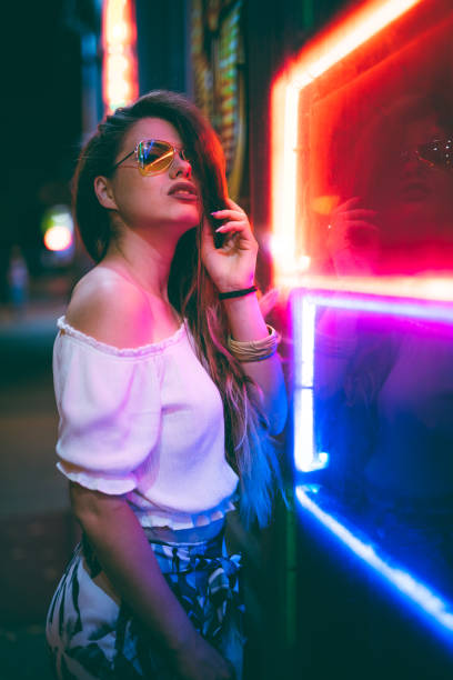 istock Woman and neon light 1272485722