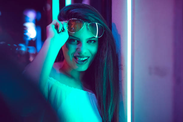 istock Woman and neon light 1272485756