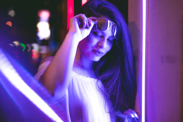 istock Woman and neon light 1272485858