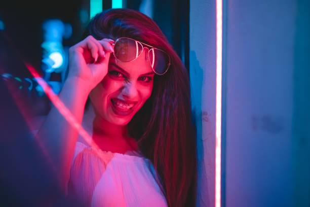 istock Woman and neon light 1272485879