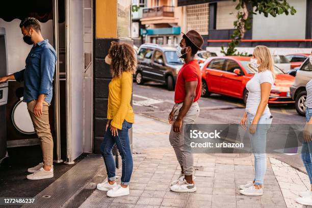Social Distancing In Line At Atm Stock Photo - Download Image Now - Waiting In Line, Bank - Financial Building, Banking