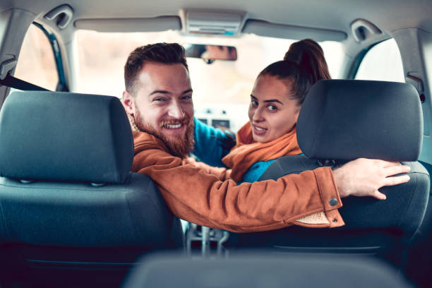 istock Smiling Couple Ready To Go On A Trip 1272486472