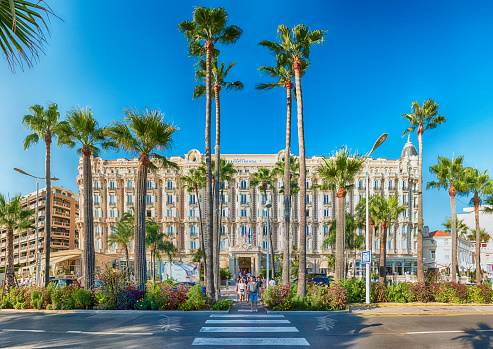 CANNES, FRANCE - AUGUST 15: The Intercontinental Carlton Hotel in Cannes, Cote d'Azur, France, as seen on August 15, 2019. It is a luxury hotel built in 1911, located on the Boulevard de la Croisette