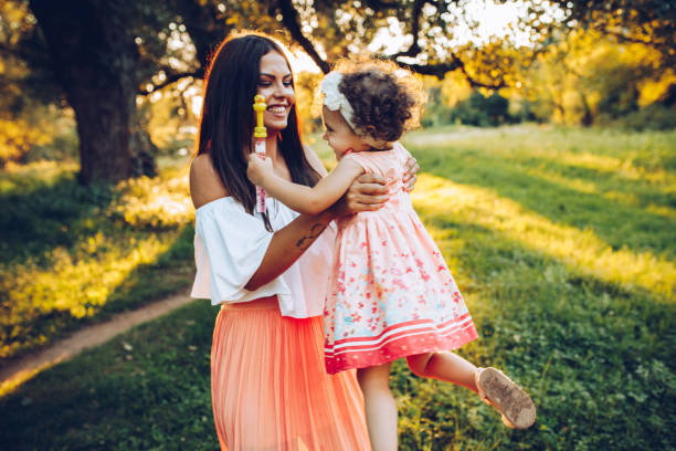istock Happy mother bonding with her daughter 1272491458
