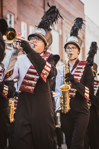 Members of the Science Hill High School marching band march down Main Street during the annual Christmas parade in Johnson City, Tennessee. (December 7, 2019)