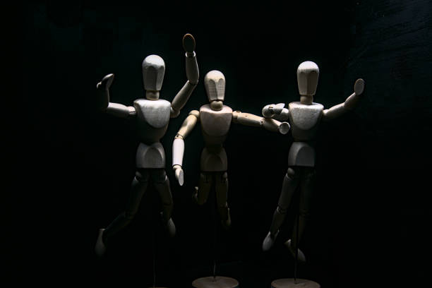 istock Drawing mannequins posing like they are jumping towards something 1272492986