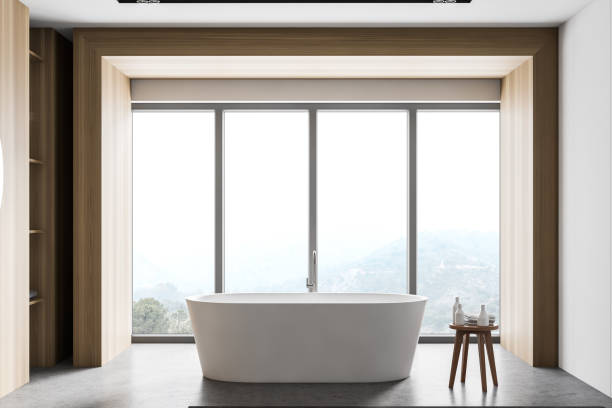 istock White and wooden bathroom interior with tub 1272493070