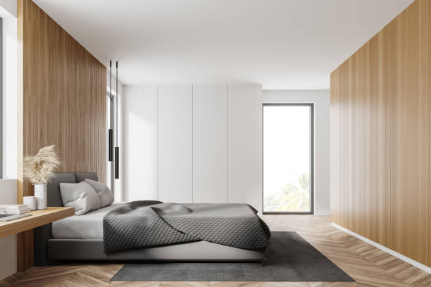 istock Wooden and white bedroom, side view 1272493872