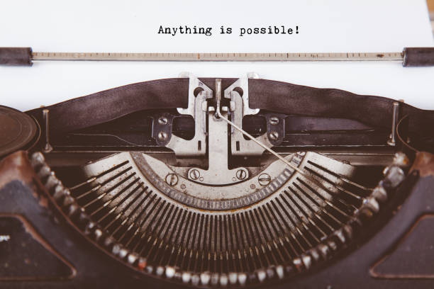 Text Everything is Possible typed on retro typewriter Text Everything is Possible typed on retro typewriter impossible possible stock pictures, royalty-free photos & images
