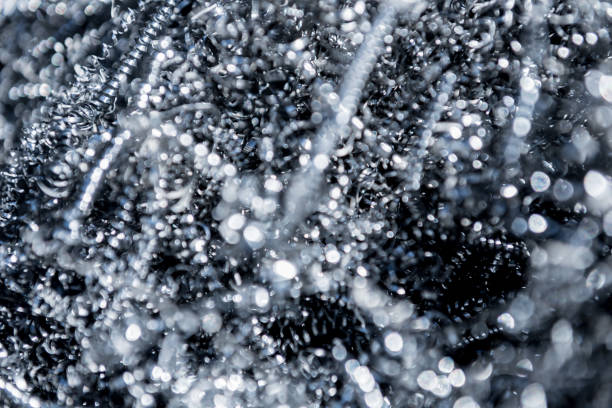 macro photo of cut yellow metal shavings, metal energy