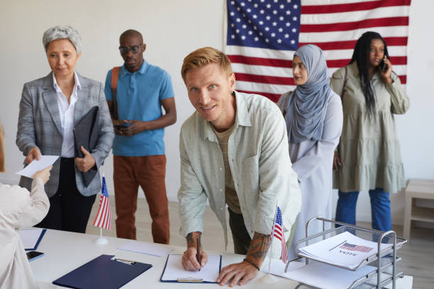 istock Voters at Polling Station 1272497352