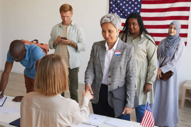 istock Citizens Registering at Voting Station 1272497359