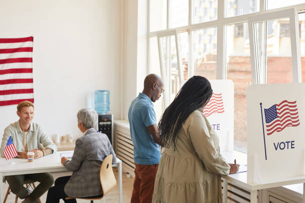 istock People Voting on Election Day 1272497410