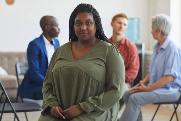 istock African-American Woman at Group Therapy Session 1272497522