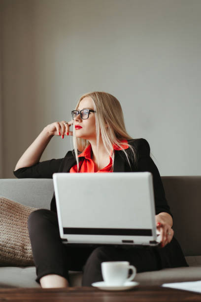 istock woman typing on laptop working from home 1272499811
