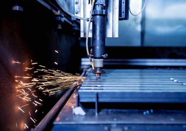 istock The laser cutting machine cutting the holes on pipes 1272500741